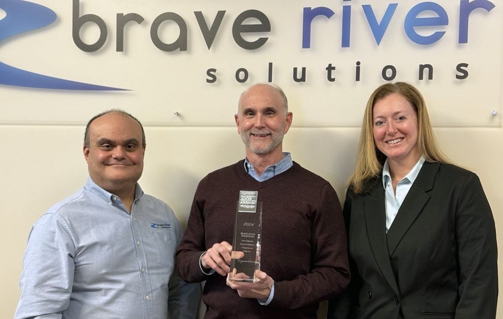 Vin, Jim and Becky holding award