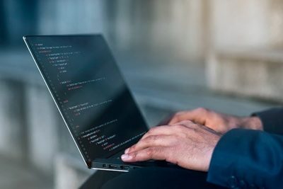 side-view-man-working-laptop